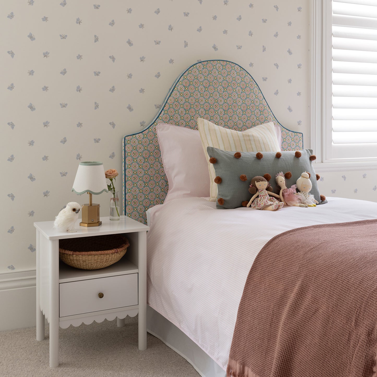 side view pastel pink and white strip bed linen