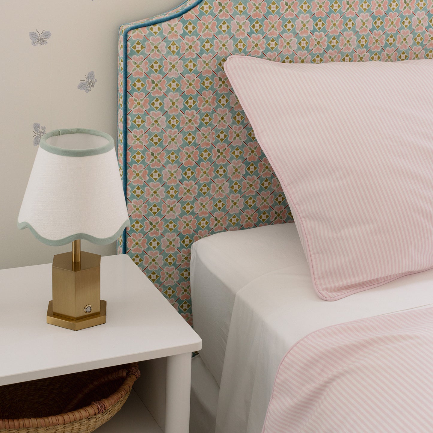 close up of pink and white stripe bedding