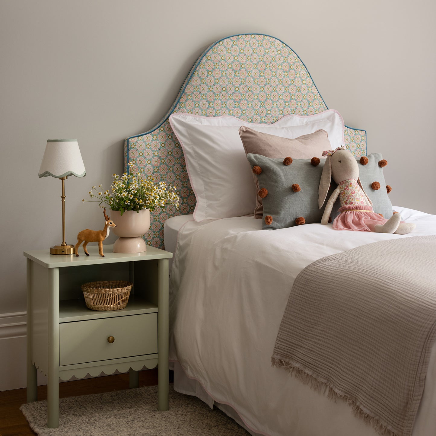 chic girls bed with grey and pink accents