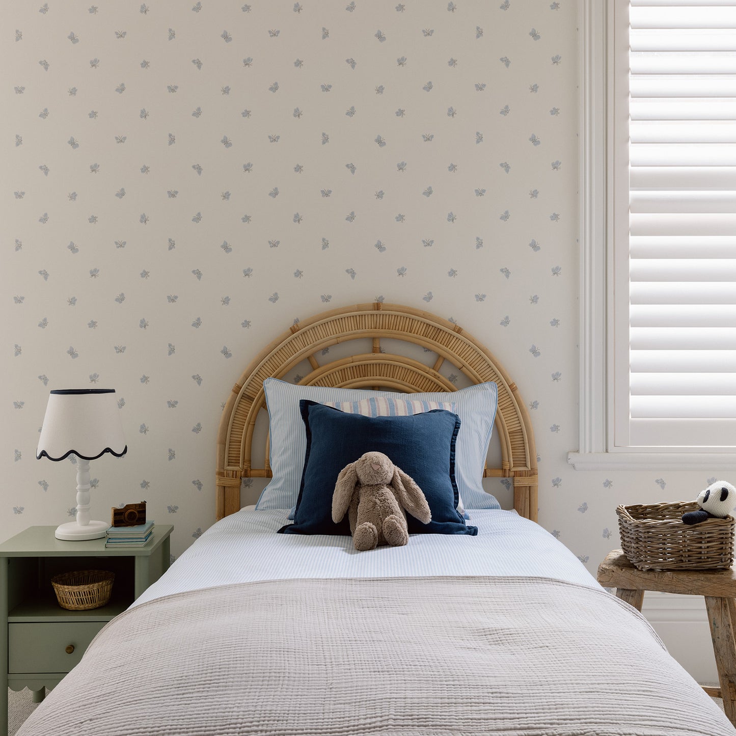 stylish boys room with blue and white stripe bed linen