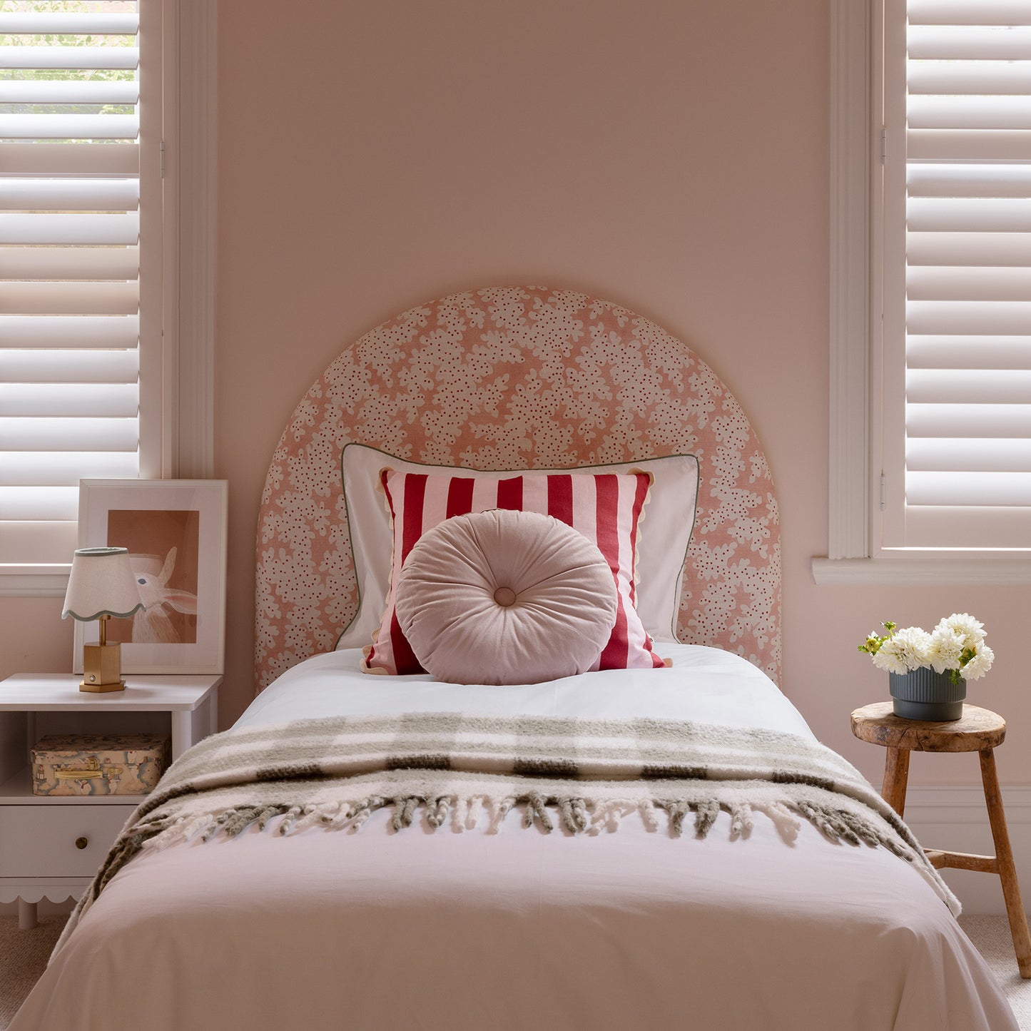 stylish girls bedroom with pink details