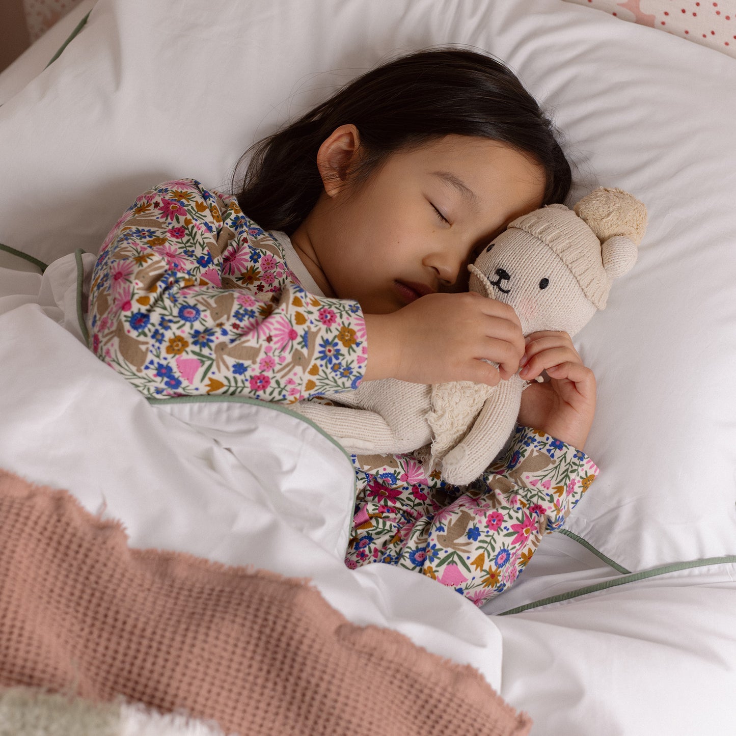 kids asleep in bed