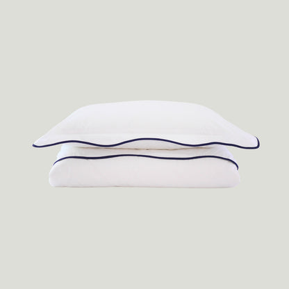 white duvet cover with navy blue wave border